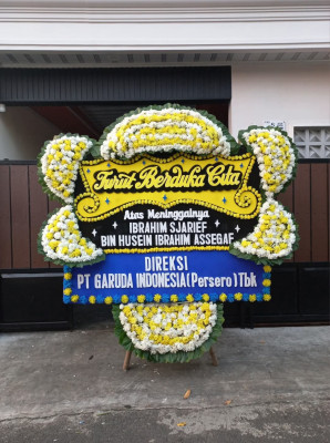 Papan Bunga Duka di Poyowa Kecil