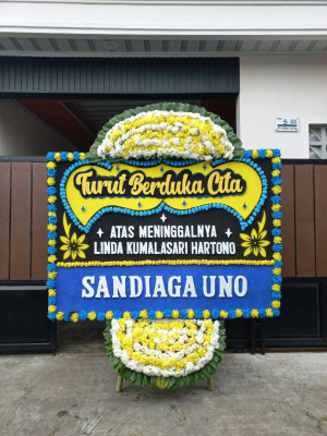 Papan Bunga Duka di Poyowa Kecil