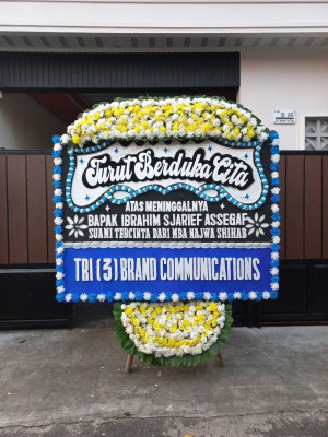 Papan Bunga Duka di Poyowa Kecil